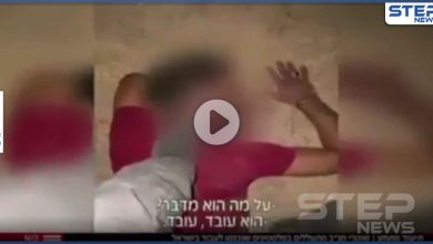 بالفيديو|| جندي إسرائيلي يدوس على رأسي عمال فلسطينيين ويهينهم