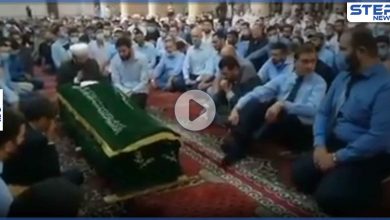 بالفيديو|| ممثلاً للأسد يشارك بتشييع محمد عدنان الأفيوني.. وإمام مسجد في اعزاز يعزي به