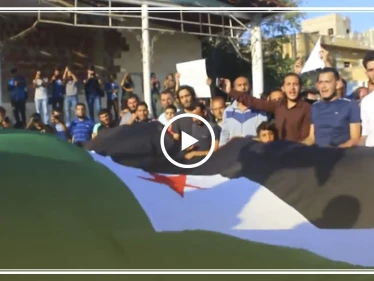 مظاهرة في مدينة إدلب رفضاً لسيطرة النظام والقوات المساندة له على ريفي إدلب وحماة .