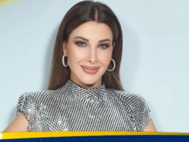 دعوى قضائية ضد نانسي عجرم بسبب صورة مع مدون إسرائيلي