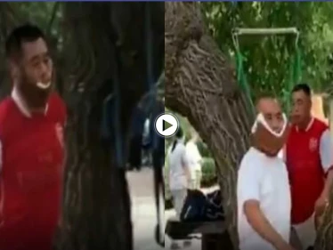 بالفيديو|| صينيون يمارسون طقوساً غريبة تقوم على ربط أعناقهم بجذوع الأشجار.. والسبب
