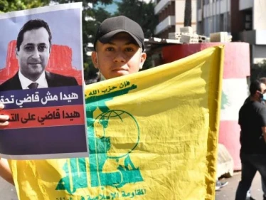 مراقب سياسي يكشف خطط خطيرة لـ "حزب الله" مع عودة القاضي بيطار إلى التحقيق
