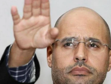 سيف الإسلام القذافي يتوجه برسالة بخط يده إلى مناصريه مضمناً إياها بآية قرآنية
