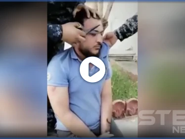 بالفيديو|| بطريقة مذلة.. الشرطة العراقية تهين شاب وتحلق شعر رأسه وحاجبيه والداخلية تتحرك