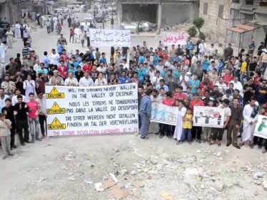 رسام كفرنبل أحمد جلل: "النصرة قتلت رائد الفارس والآن تلاحقني"