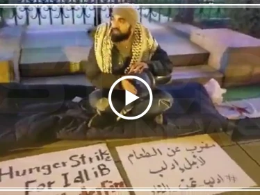 بالفيديو || لأجل إدلب.. ناشط سوري يعلن إضرابه عن الطعام من أمام منزل القنصل الروسي في واشنطن