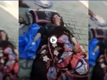 بالفيديو|| امرأة مسنة مرمية أمام مستشفى اليرموك في العراق تصرخ وتطلب المساعدة من المارة تثير الجدل