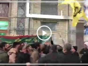 شاهد بالفيديو|| تشييع قائد ميليشيا "فاطميون" بعد إصابته في سوريا