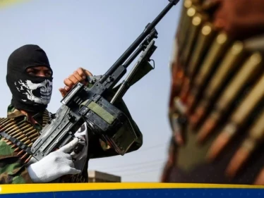 فصيل عراقي يهدد أمريكا بما سيفعله حال اندلعت حرب مع إيران