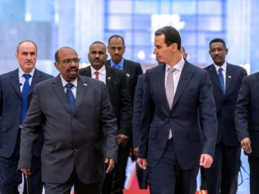 الأسد يستقبل رئيس السودان بدمشق في أول زيارة لرئيس دولة منذ 7 سنوات