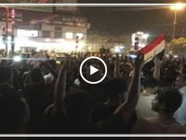 شاهد بالفيديو|| الأمن العراقي يوقع قتلى وجرحى في صفوف المتظاهرين ببغداد