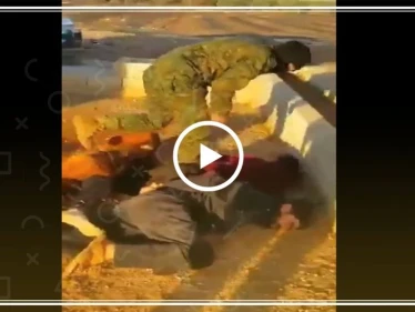عنصر من "قسد" يخلع حجاب امرأة ضمن مراسم تعذيب لمعتقلين!!(فيديو)