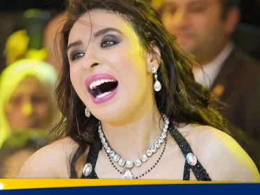 شاهد|| الراقصة المصرية دينا تدافع عن آل الأسد وتكشف ما كانت تفعله مع باسل في أحد فنادق دمشق