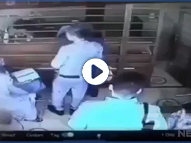 بالفيديو|| ضابط عراقي يتحرش بفتاة في محل صرافة ويهدد صاحبه باغتصاب بناته.. وكاميرا توثق