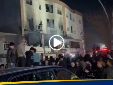 شاهد|| حريق كبير يلتهم مبنىً سكنياً جامعياً شمال العراق.. وسقوط عشرات الضحايا