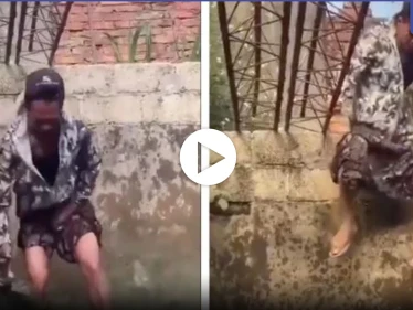 بالفيديو|| آسيوي ينزل في بركة مليئة بالتماسيح.. ويحاول الإمساك بهم