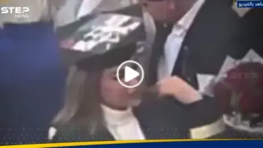 جامعة عراقية تتخذ إجراءً ضد طالبة وضعت صورة صدام حسين على قبعة تخرجها (فيديو)