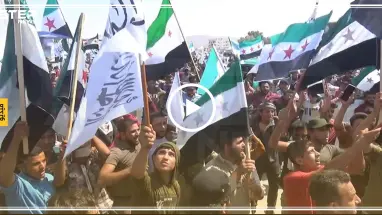 مظاهرة حاشدة وسط ساحة سرمدا تندد بإجرام النظام والروس