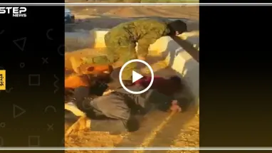 عنصر من "قسد" يخلع حجاب امرأة ضمن مراسم تعذيب لمعتقلين!!(فيديو)