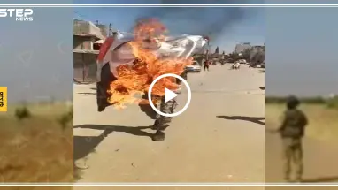 شاهد إحراق المتظاهرين لصورة اردوغان ضمن مظاهرات باب الهوى شمال ادلب