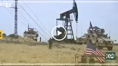 شاهد بالفيديو || مدرعة أمريكية ترابض بجانب أحد المضخات النفطية في رميلان