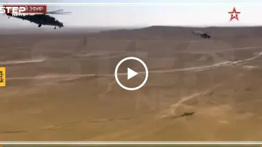 شاهد بالفيديو|| مدرعات عسكرية ووفد روسي ضخم يصل إلى تدمر على متن طائرات هليكوبتر!!