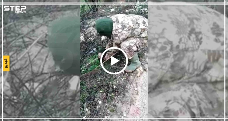 شاهد بالفيديو|| حاملًا رأس عنصر لقوات النظام السوري.. مقاتل لتحرير الشام يوجّه رسالة!