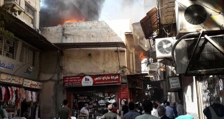بالفيديو|| حريق ضخم في سوق الحريقة وسط دمشق يوقع قتيل وحالات اختناق