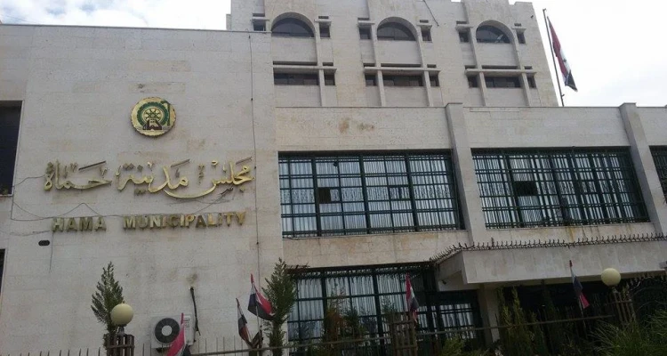مجلس حماة ينذر أهالي أحد الأحياء بإخلائه في أسبوع، بحجة أنها منطقة مخالفات